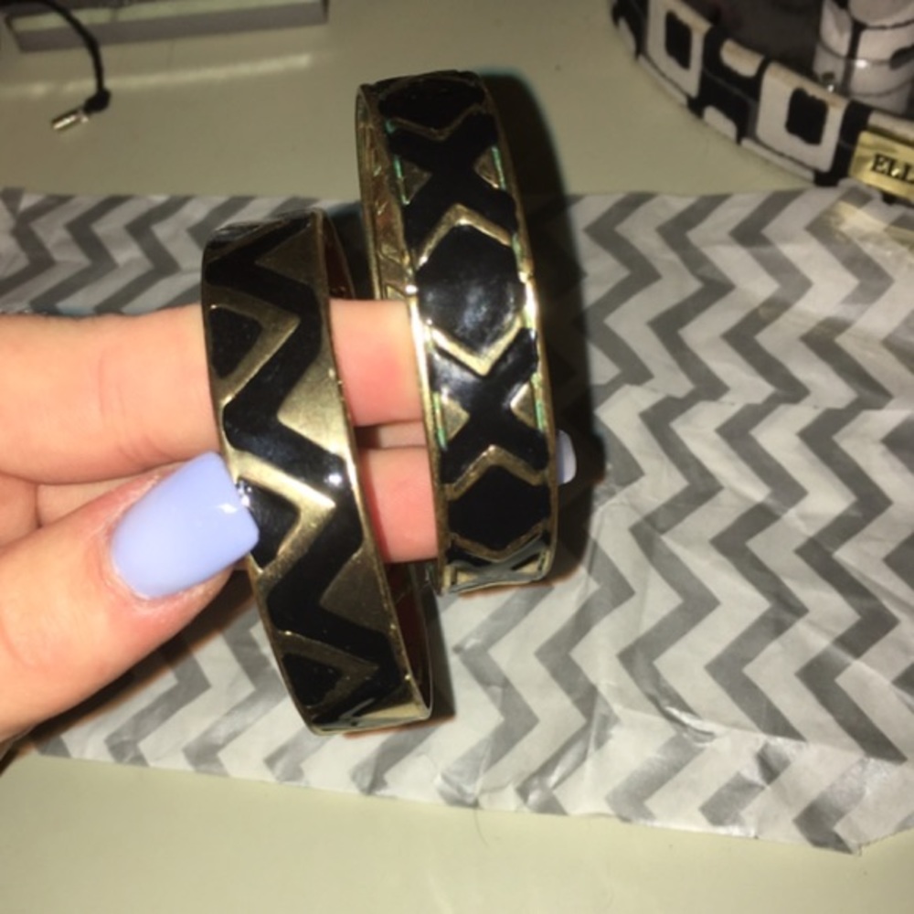 Gold and black bracelets
